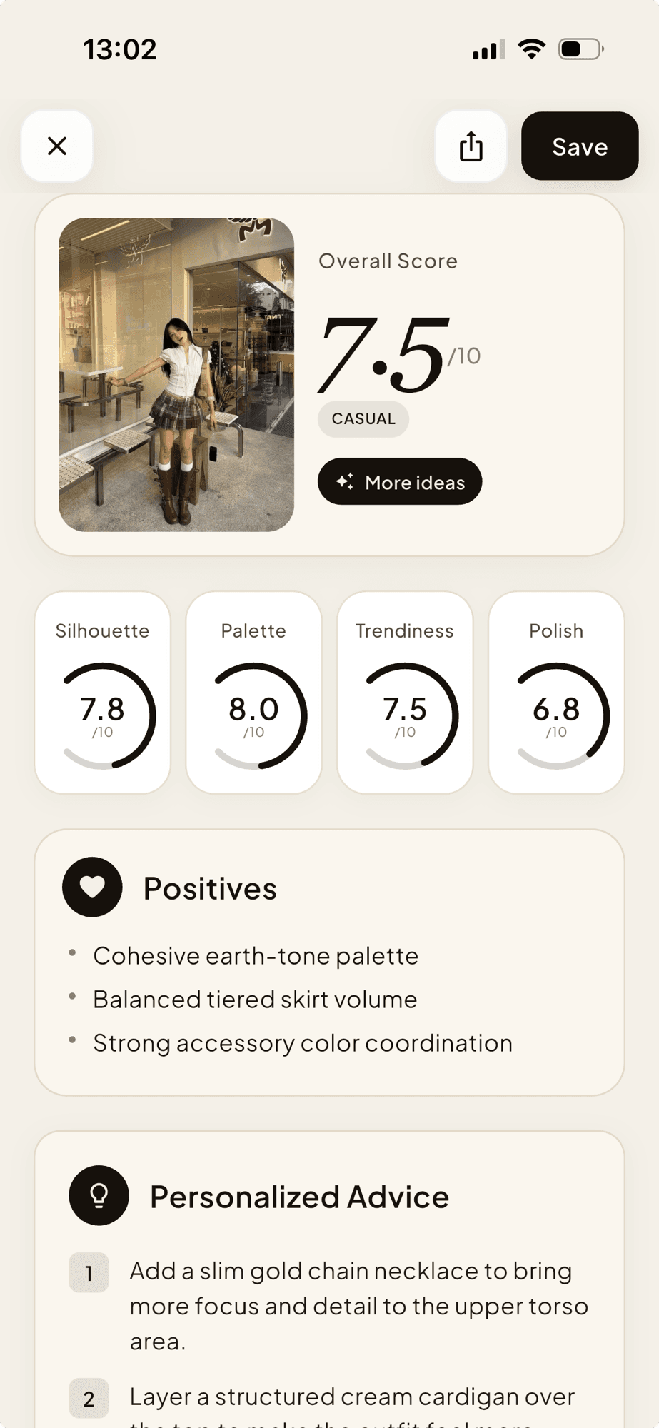 The Outfit Rater app showing an outfit rating with category scores and personalized styling advice